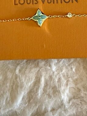 Louis Vuitton Gold bracelet with Turquoise Flower Motif